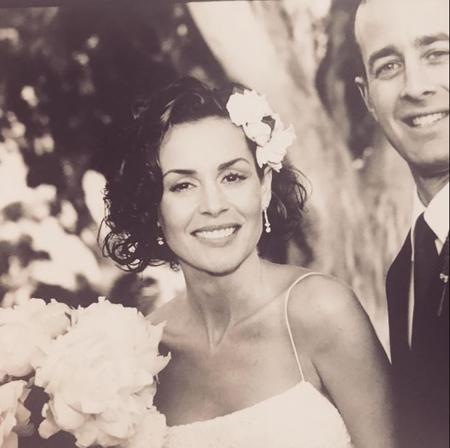 Embeth Davidtz and her husband Jason Sloane during their marriage ceremony.